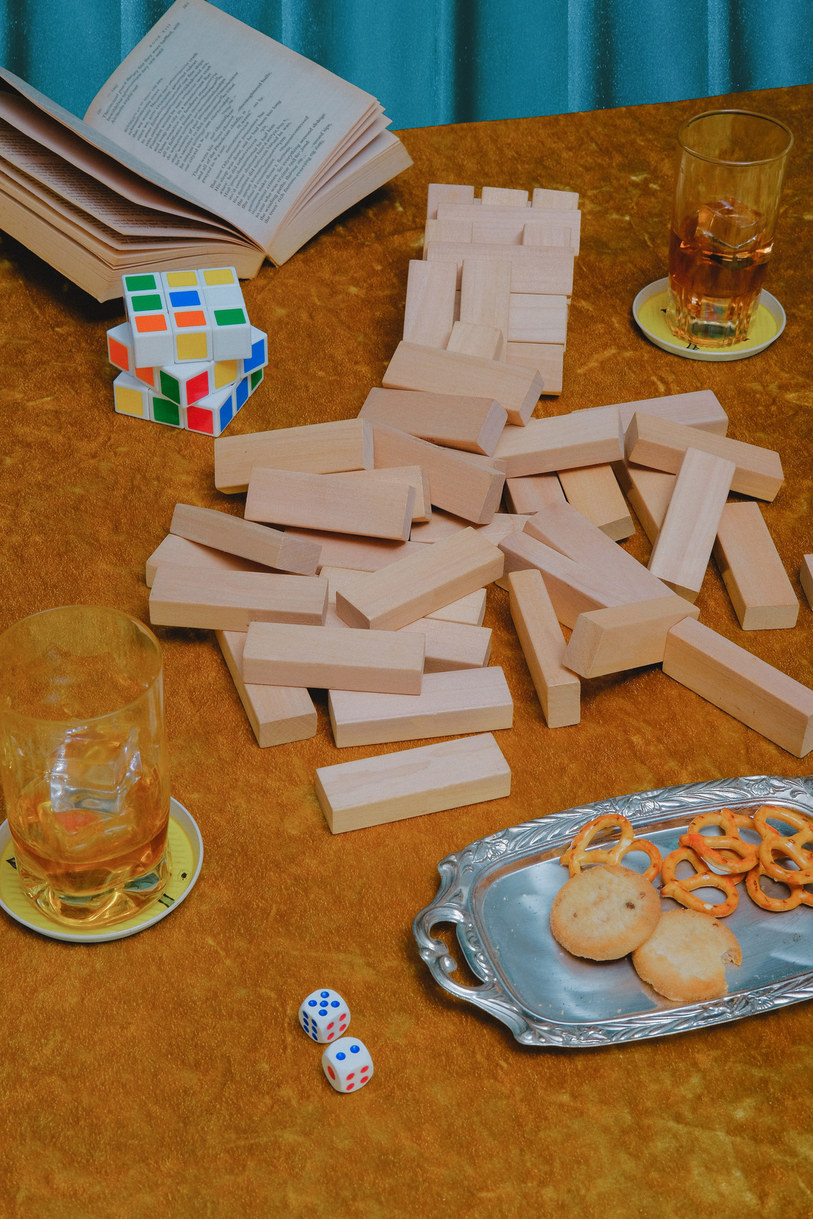 Jenga with Whiskey and Snacks on Table